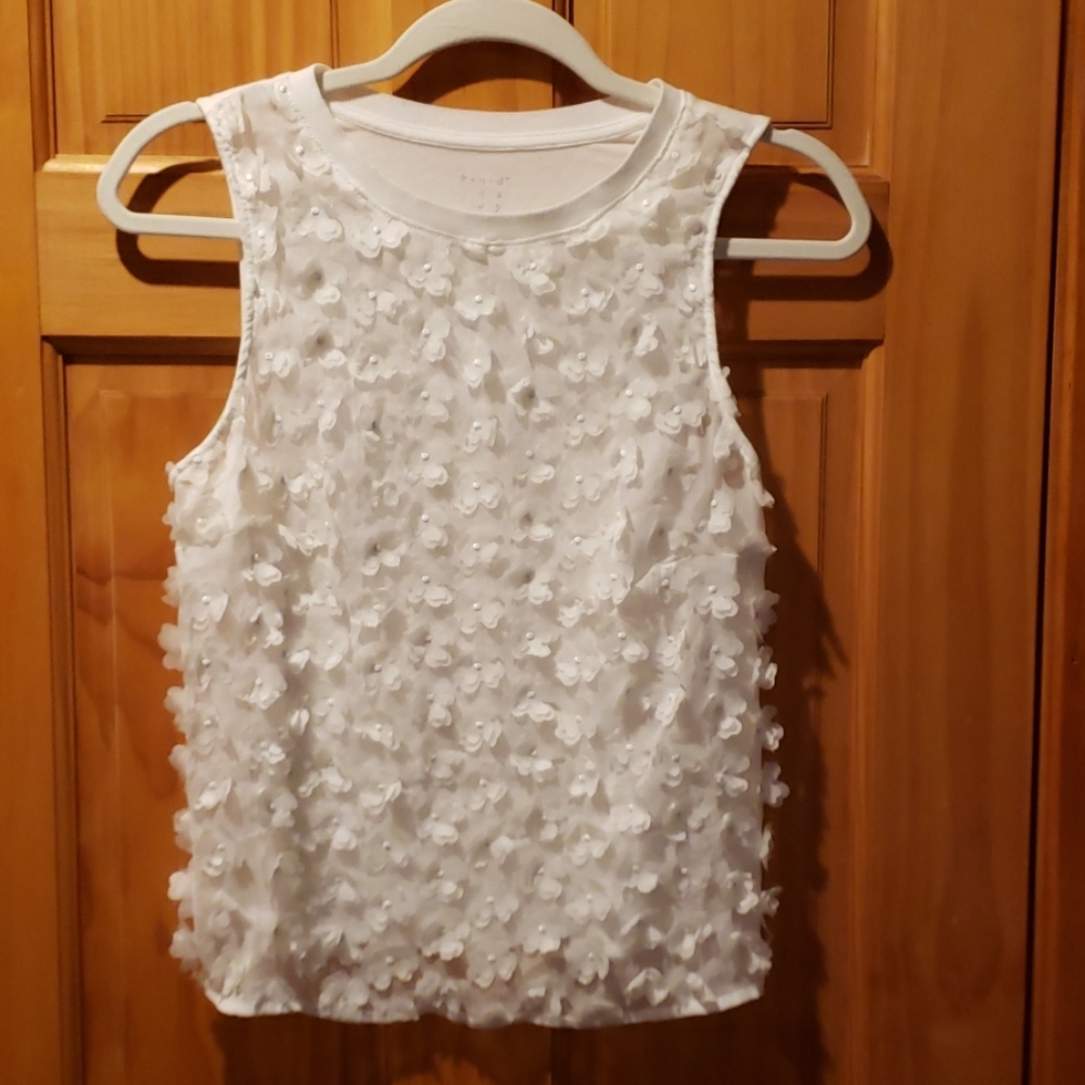 A New Day white sheer front tank with small floral applique